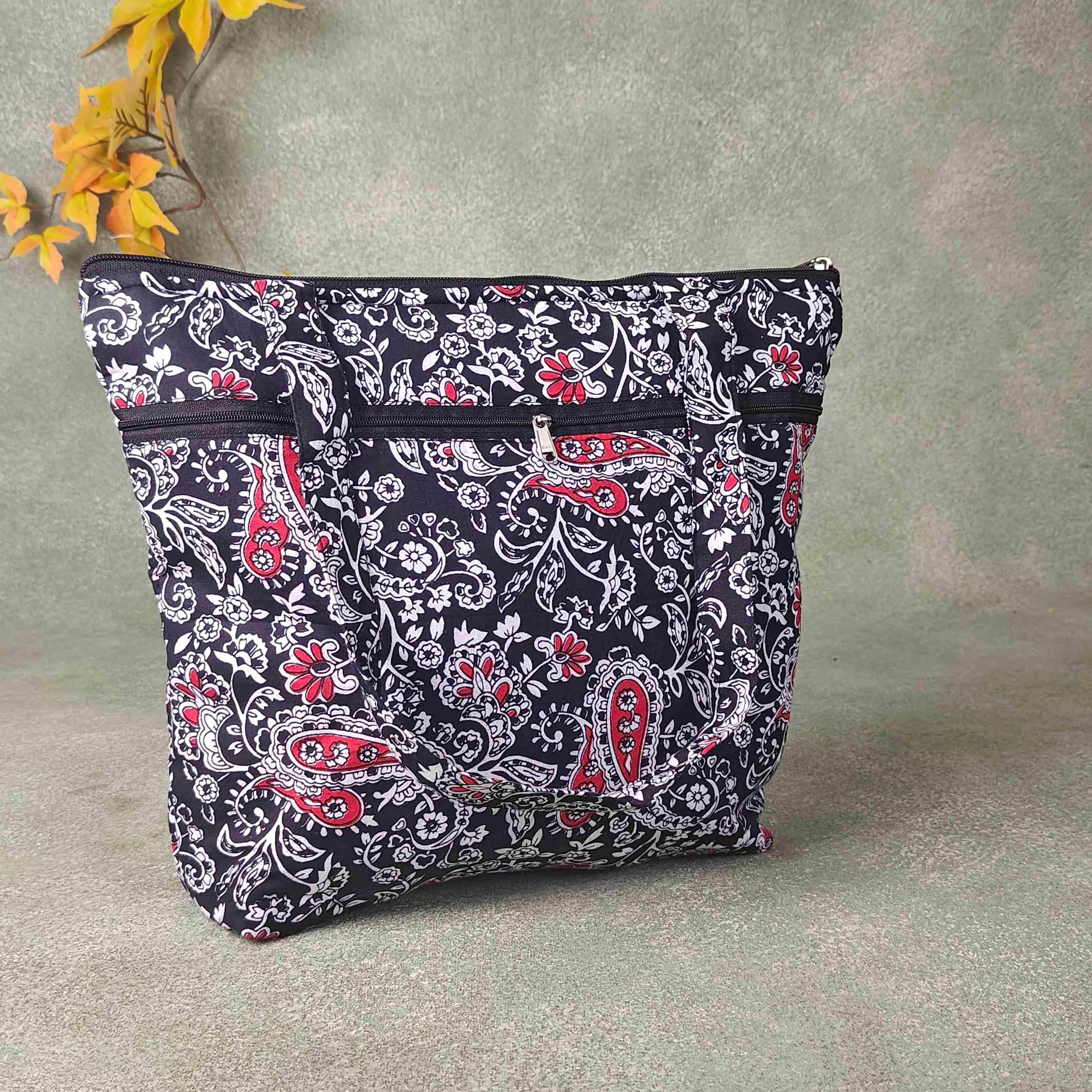 Medium Size Handbag Black Colour with White and Red Flower Leaf Design Prints.